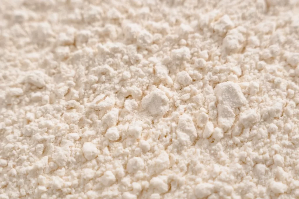 白色粉末质感特写,类似面粉或糖