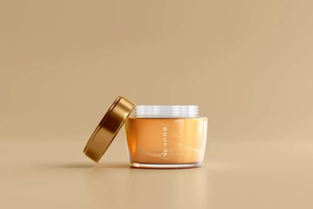 a jar of honey with a gold lid