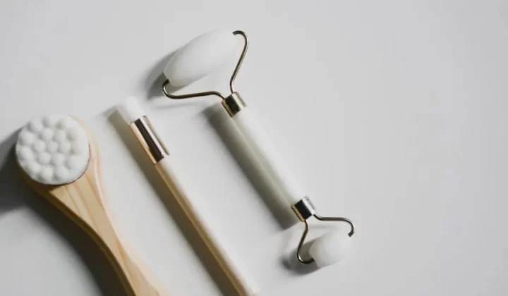silver spoon and fork on white surface
