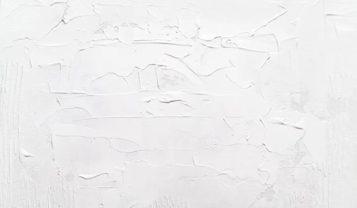 a white wall with some white paint on it