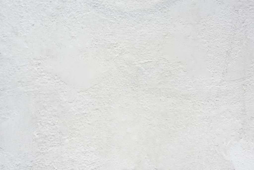 white textured plaster wall surface