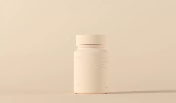 a bottle of medicine sitting on top of a table