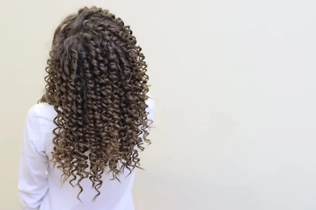 a woman with a large braid