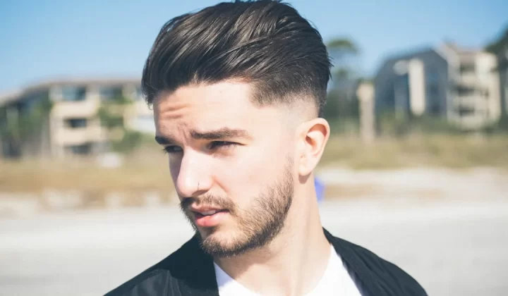 selective focus photography of man wearing black suirt
