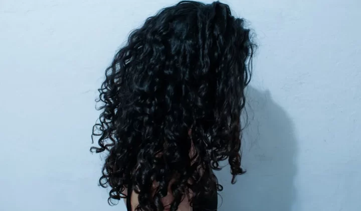 a person with the hair pulled back