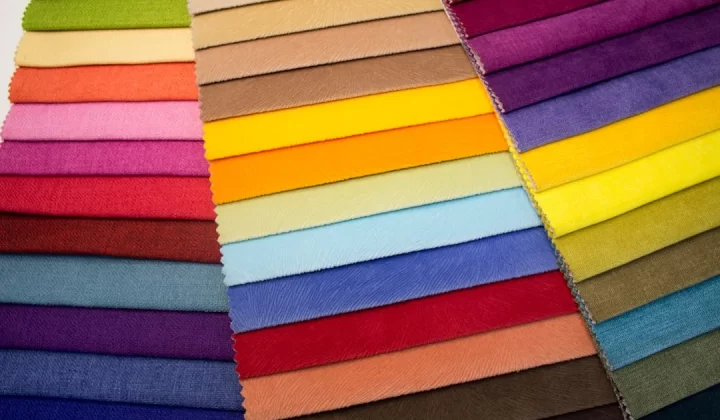 multi colored striped textile on brown wooden table