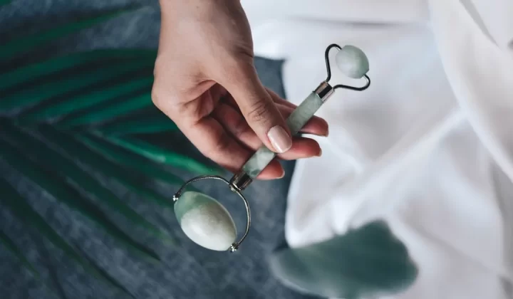 gray and black spoon in person's hand
