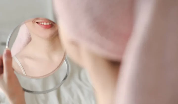 a woman wearing a white shirt