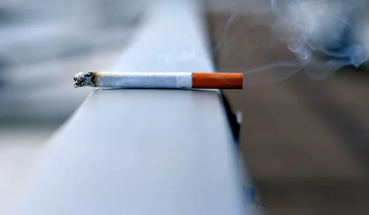 white cigarette stick on white wall
