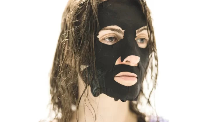 woman with black face mask