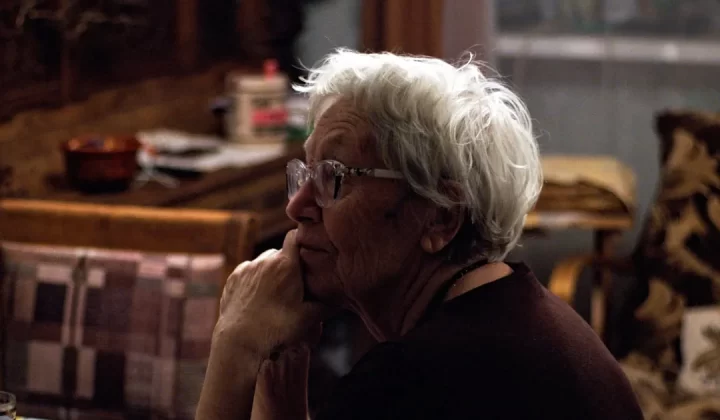 woman in black shirt wearing eyeglasses