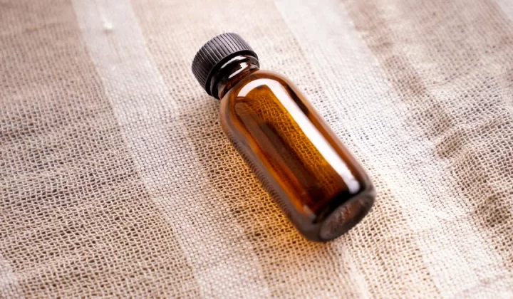 a brown bottle sitting on top of a table